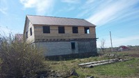 Продаю участок, 9 соток, з накритим недостроїним деревяним будинком в Новоград-Волинському