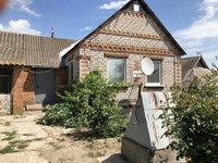 Продам дом 58 кв. м на участке 24 сотки в центре села Шолохово Днепропетровский район